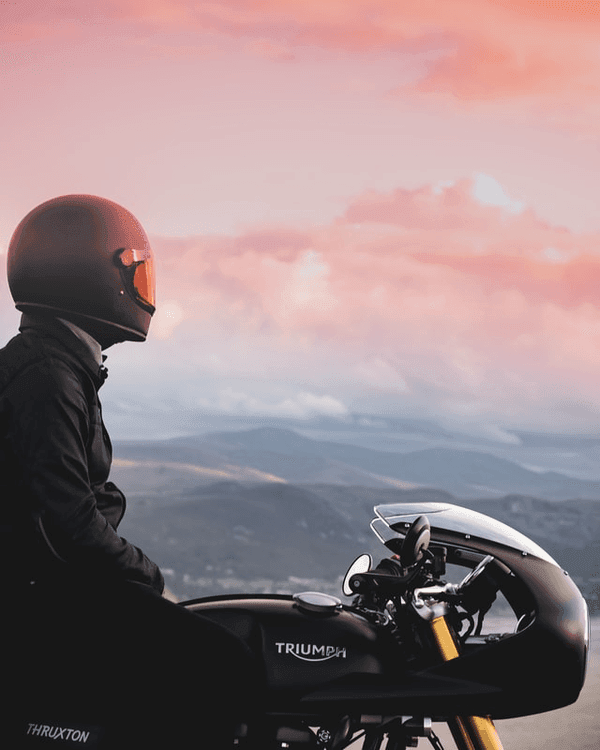 Triumph biker looking at view